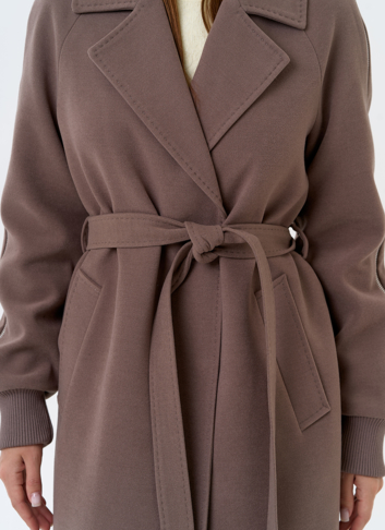 Женское пальто с декоративными молниями